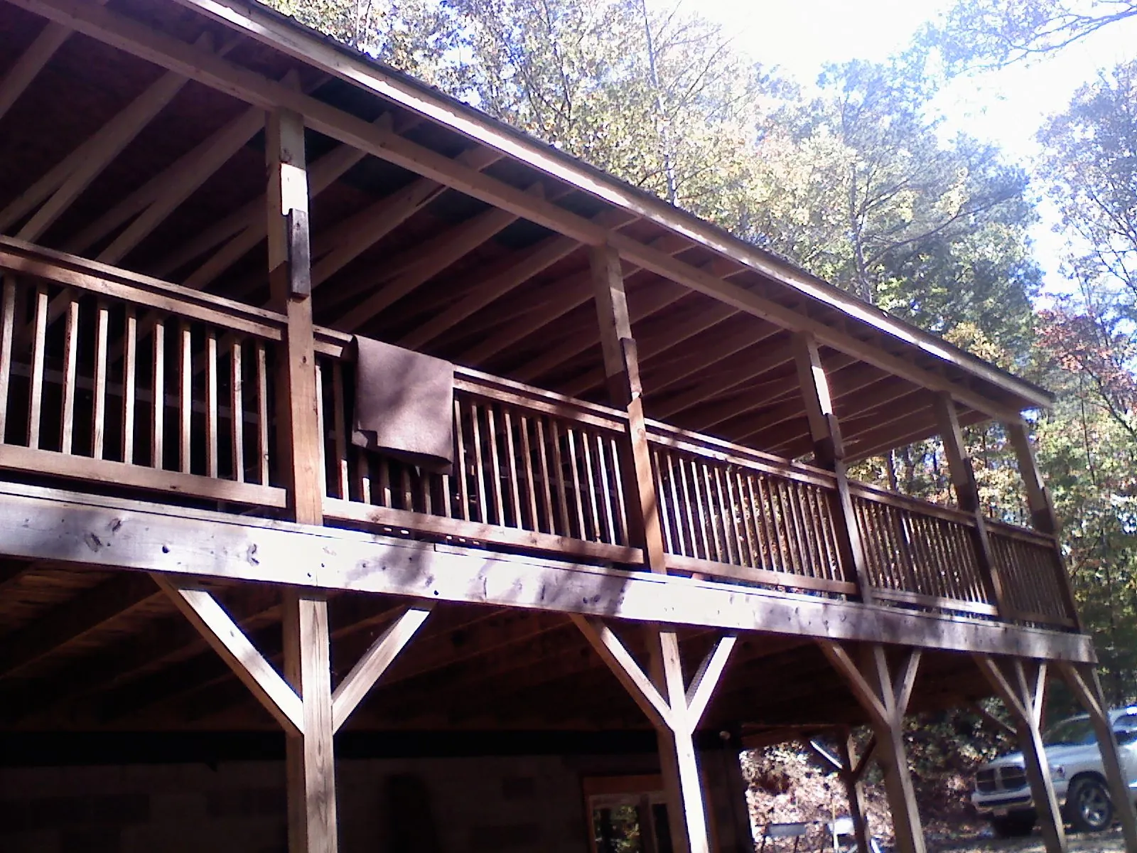 Timber framing under a new elevated porch and deck — Roof Leak Repair in Effort by Roofing Brothers